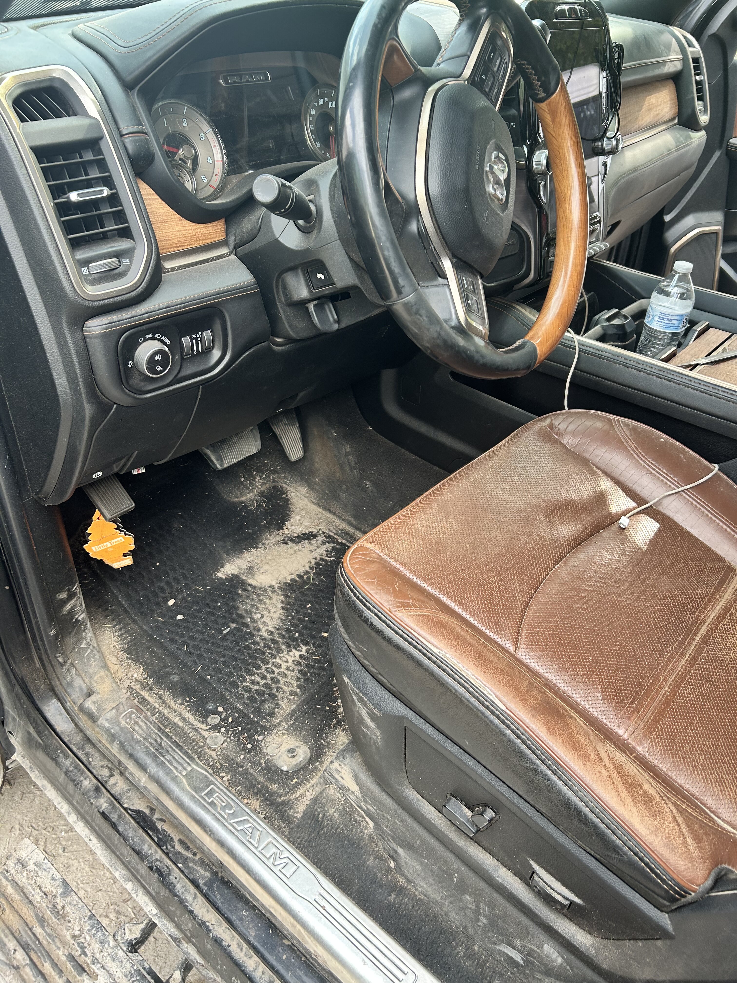 Driver floor mat before